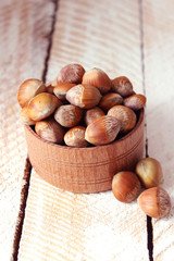hazelnuts against the background of wood. useful snack.