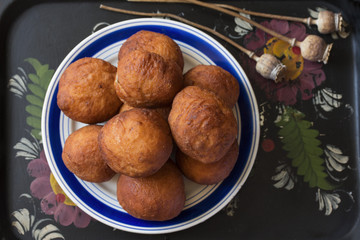 hot whole homemade round fried donuts with poppy seeds