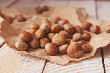 hazelnuts against the background of wood. useful snack.