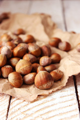 hazelnuts against the background of wood. useful snack.