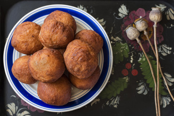 sweet homemade simple round fried donuts with poppy seeds
