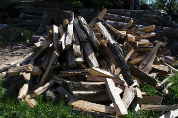 Cut logs fire wood. Renewable resource of energy. Environmental concept. Pile of chopped fire wood...