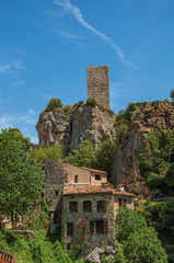 Close-up of houses facing the garden and cliff in Chateaudouble, a quiet and tourist village with medieval origin on a sunny day. Located in the Var department, Provence region, southeastern France