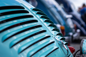 A close up look at an old classic car. Retro automobile exterior scene. Old vehicle.