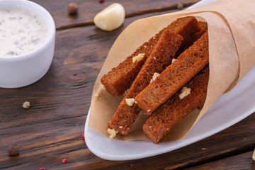 The croutons fried in oil with garlick sauce and garlic with greens