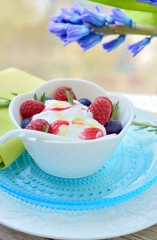 Ice cream with raspberries and blueberries