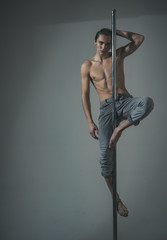 Sport and art concept. Attractive, sexy man with long hair,