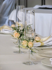 Festive wedding glasses - wedding ceremony. Goblets for the groom and the bride in the interior