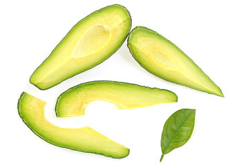 Avocado slices with leaf on white background. Food concept. © domnitsky