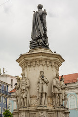 Statue with Fancy Pedestal and Pigeons