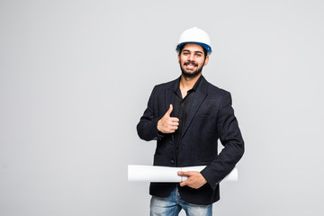 Young indian architect with thumbs up posing to the camera isolated on white background.