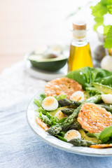 Asparagus Salad with quails eggs and cheese crisps