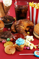 Unhealthy products. food bad for figure, skin, heart and teeth.