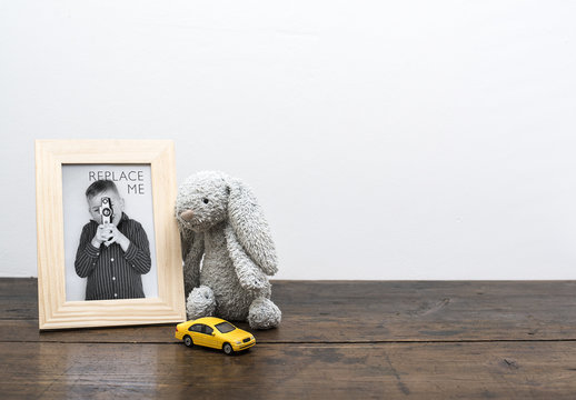 Wood Framed Photo with Children's Toys Mockup