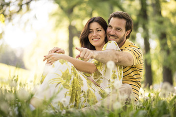 Portrait of middle age couple at nature. Spring season.