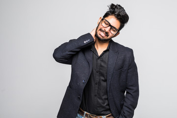 Portrait of a business man having a neck pain isolated on white background