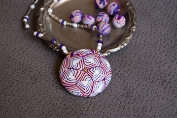 Unique floral motif pendant in pink and white color. Hamdmade jewelry from polymer clay. Fashion accessory for lady.
