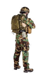 Portrait soldier or private military contractor holding sniper rifle.