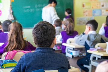School children are participating actively in class. Lesson