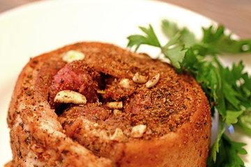 food baked fat in spices on a plate