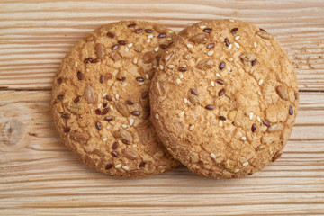 Vegan crunchy cookies with sunflower, flax seeds and sesame seeds isolated. Macro view