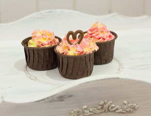 delicious homemade cupcakes with delicate cream