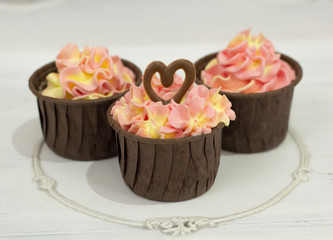 delicious homemade cupcakes with delicate cream