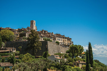 Fototapeta na wymiar Panoramic view of the village of Saint-Paul-de-Vence on top of hill, a lovely well preserved medieval hamlet near Nice. Located in the Alpes-Maritimes department, Provence region, southeastern France