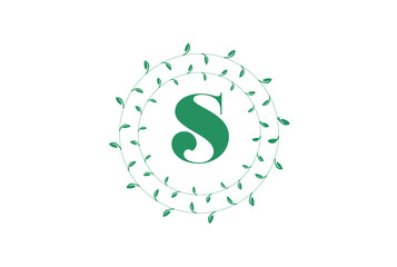 Letter S logo with round green leaves. Elegant floral monogram template design