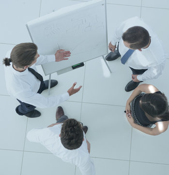 view from the top. background image of a business team discussin