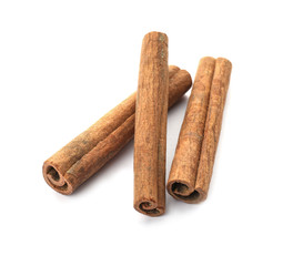 Aromatic cinnamon sticks on white background