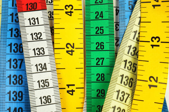 Different measuring tapes, closeup