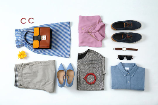 Flat lay set of stylish clothes and accessories on white background
