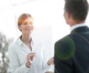 business woman talking with a colleague..