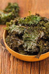 Baked Crispy Kale Chips. Selective focus.