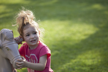 babygirl playing at playground
