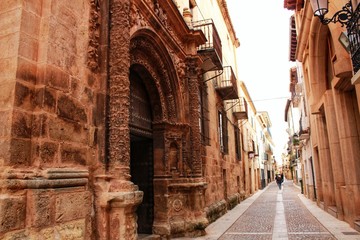 Fototapeta na wymiar Narrow streets with Renaissance style houses in Alcaraz, Spain