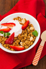 Strawberry Cinnamon Granola Yogurt Breakfast. Selective focus.