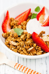 Strawberry Cinnamon Granola Yogurt Breakfast. Selective focus.