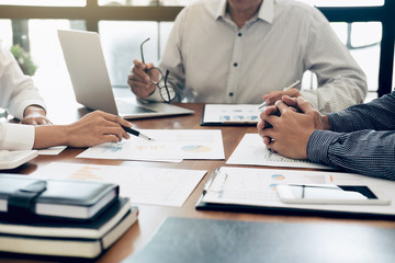 Business team colleagues meeting to conference professional investor working and discussing a new marketing business strategy project, Business finance and accounting concept