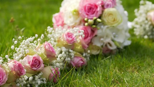 Wedding bouquet with wild flowers on the grass