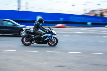 motorcycle on the road, driving on asphalt at speed