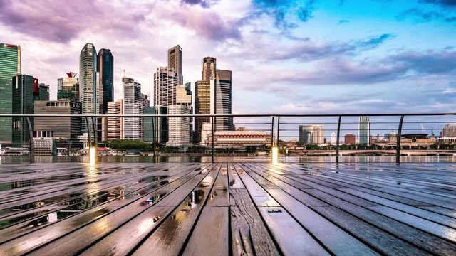 Early Morning Timelapse of Singapore City, with beautiful Sunrise Colors - zooming out 