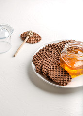 Chocolate waffles with honey.