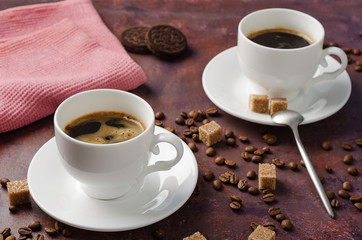 Coffee in cup on dark background