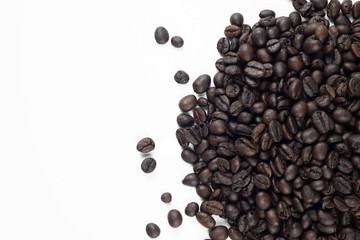 Roasted coffee beans on white background