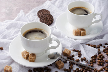 Coffee in cup on light background