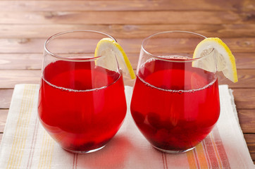 Glass of cranberry fruit drink.