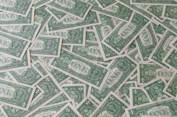 A lots of American one dollars paper money.