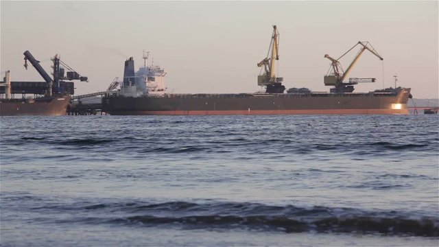 Cranes unloading coal from a cargo ship.
Ventanas Port, Chile